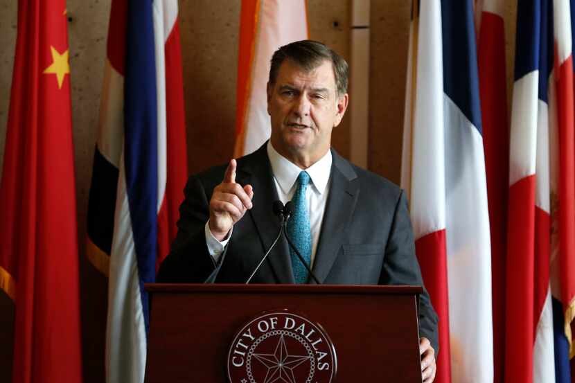 Dallas Mayor Mike Rawlings speaks during a press conference at city hall in Dallas on...