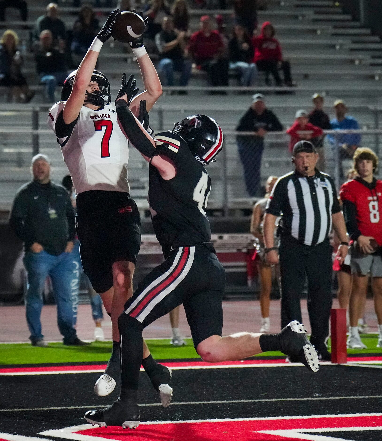 Melissa tight end Gunnar Wilson (7) catches a pass over Lovejoy linebacker Bennett Slaughter...