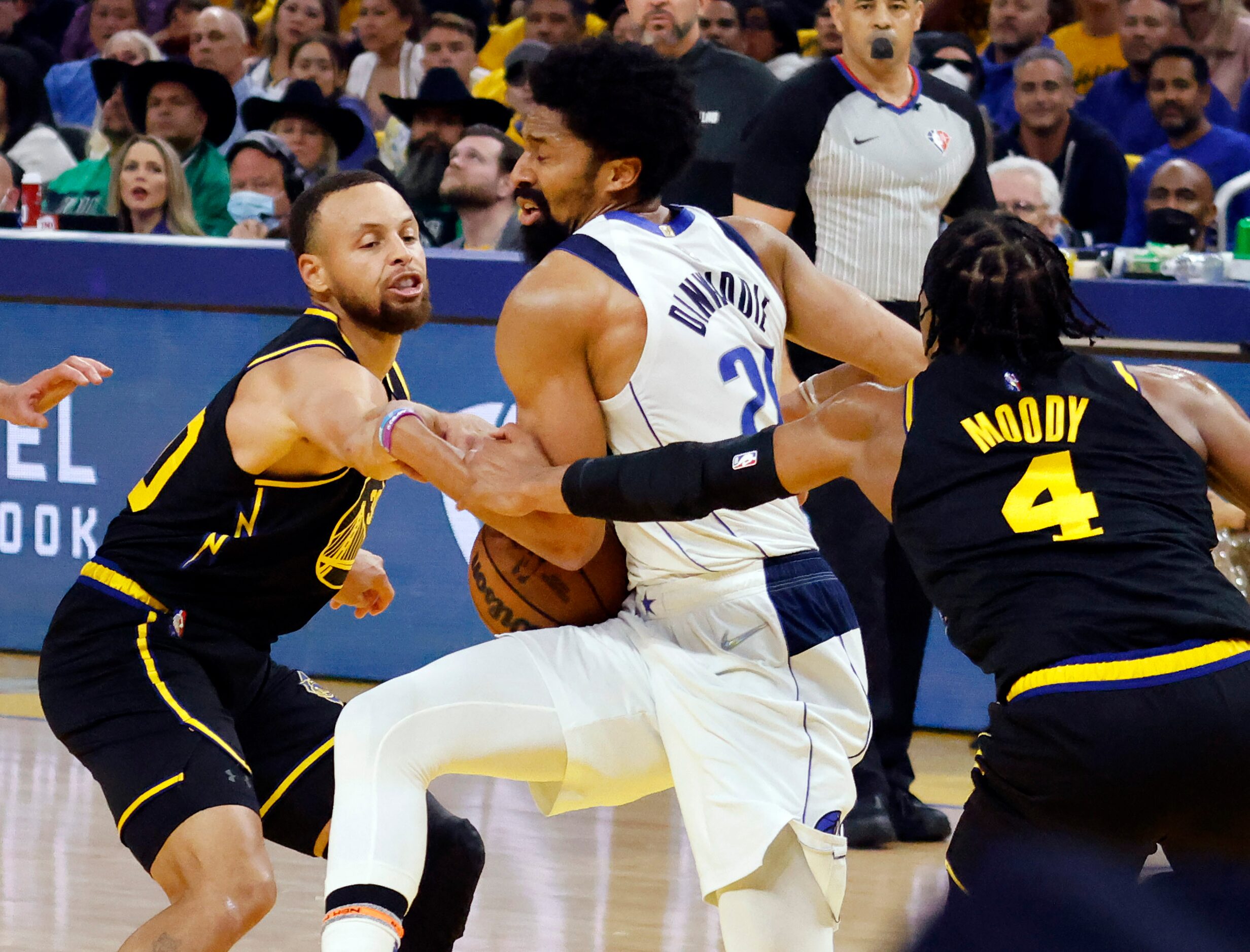 Dallas Mavericks guard Spencer Dinwiddie (26) has the ball stripped by Golden State Warriors...