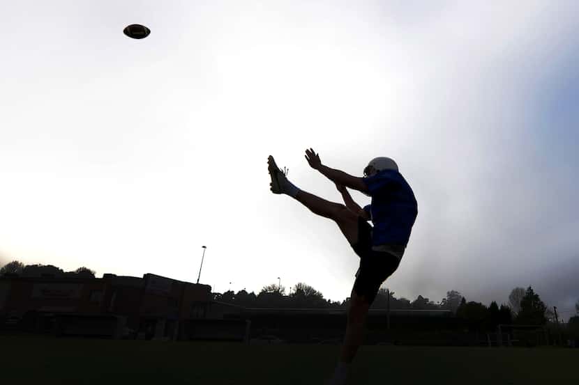 FILE - In this June 12, 2015, file photo, Michael Dickson practices his punting at the...