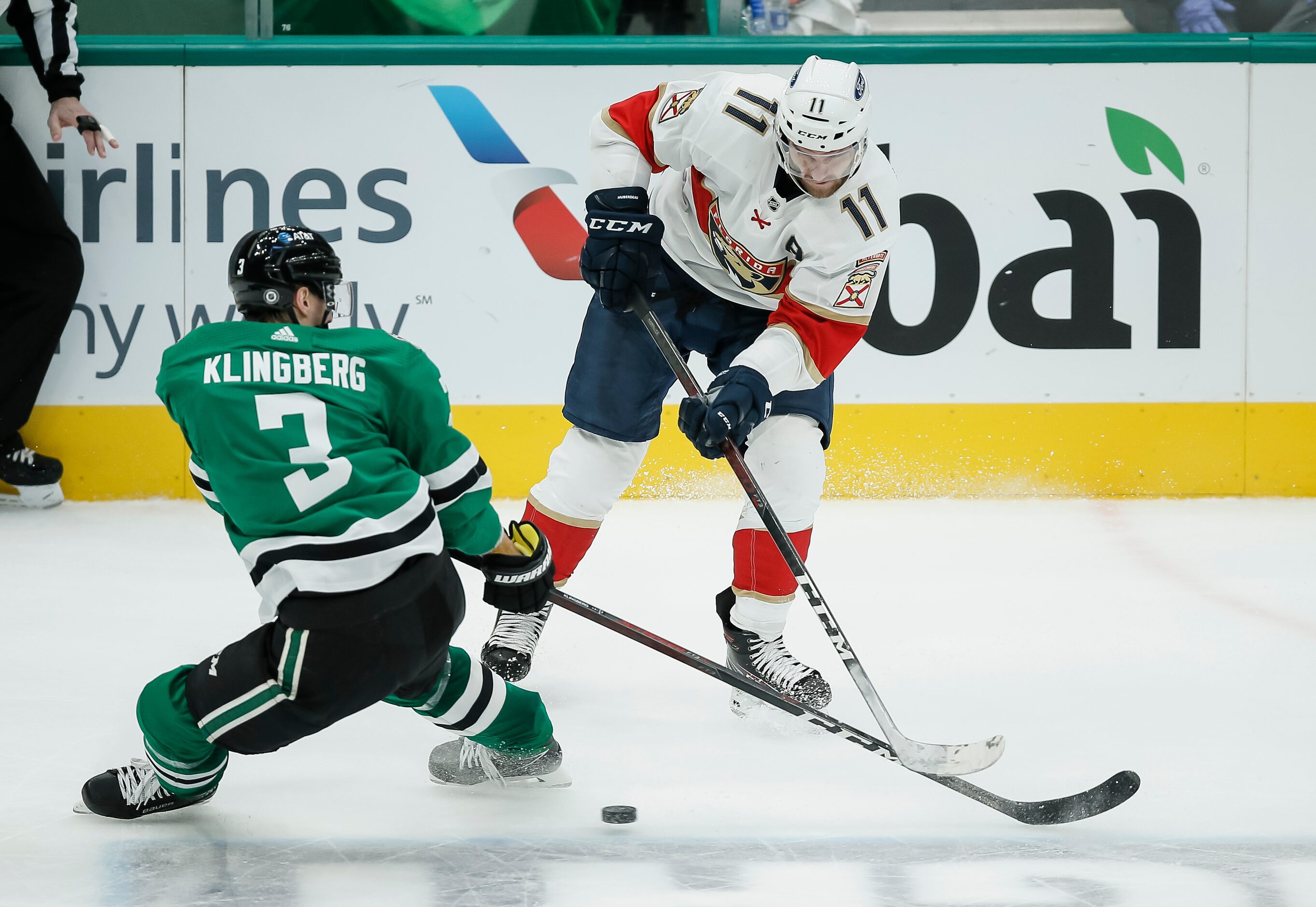 Florida Panthers forward Jonathan Huberdeau (11) passes as Dallas Stars defenseman John...