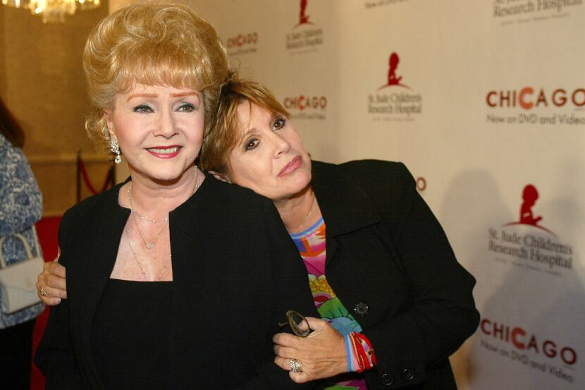 In this Tuesday, Aug. 19, 2003 file photo, Debbie Reynolds and Carrie Fisher arrive at the...