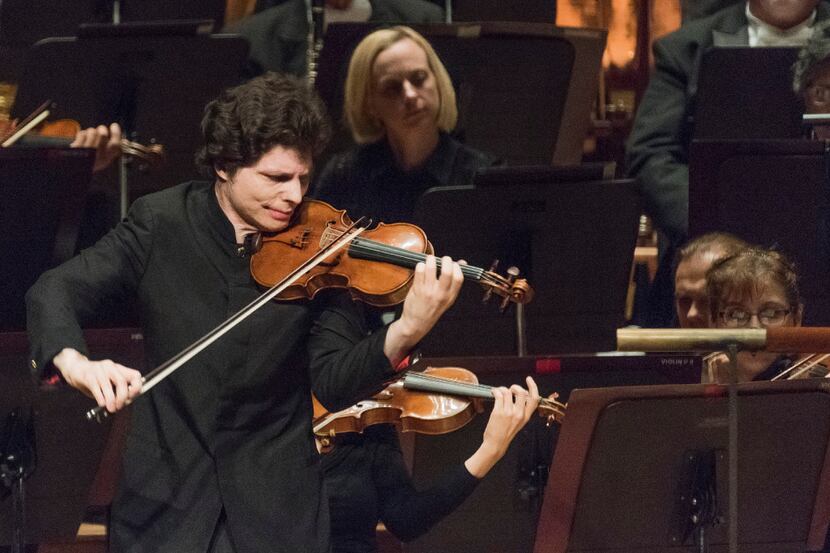 Violinist Augustin Hadelich performs with the Dallas Symphony Orchestra at the Morton H....