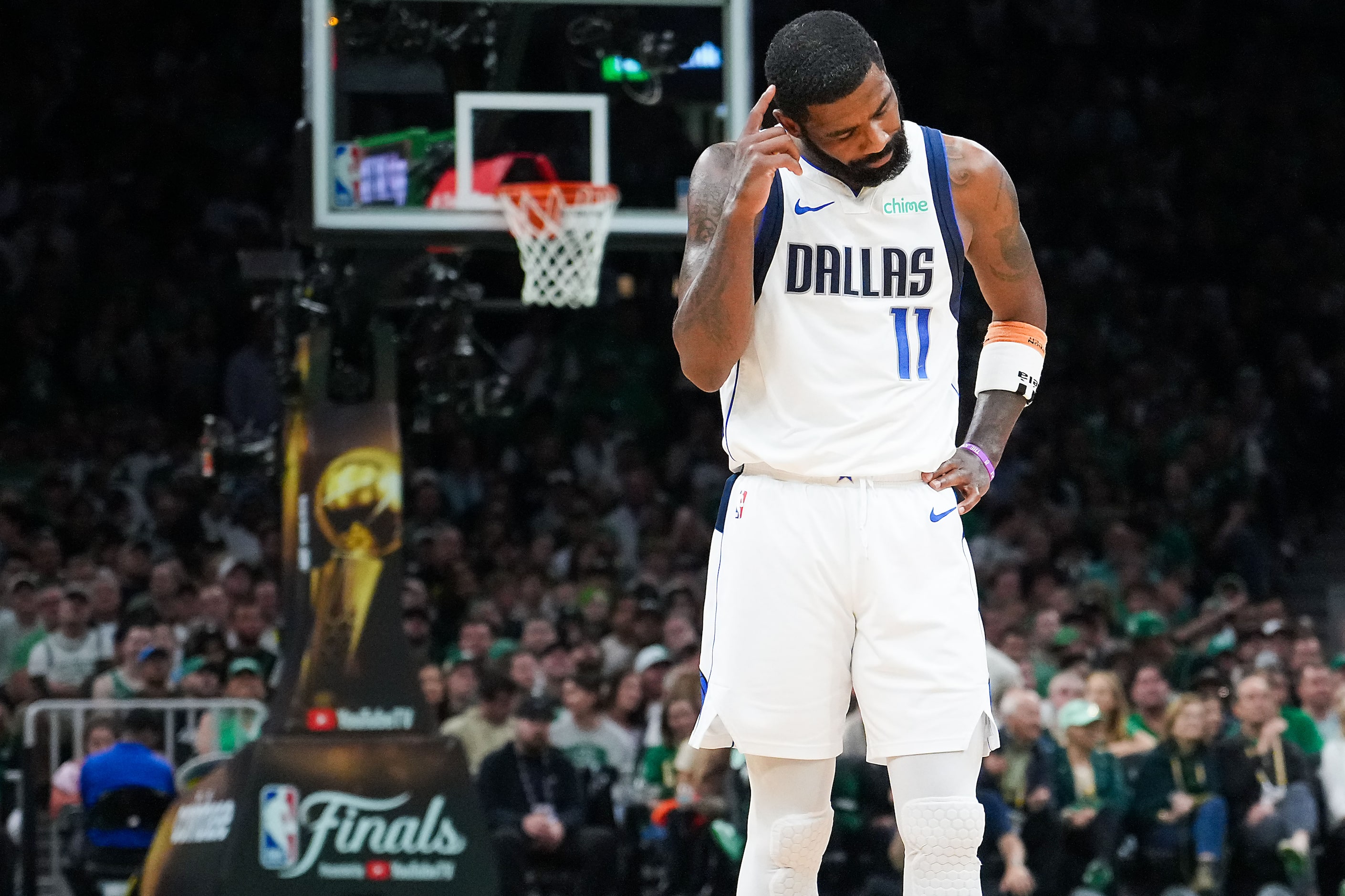 Dallas Mavericks guard Kyrie Irving (11) reacts after a Mavericks foul during the second...