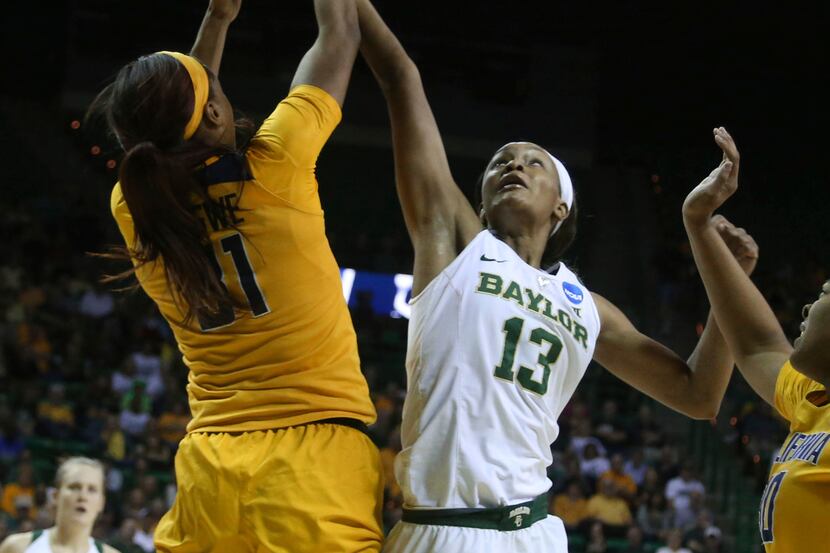 Baylor forward Nina Davis, right, reaches for a rebound with California forward Kristine...