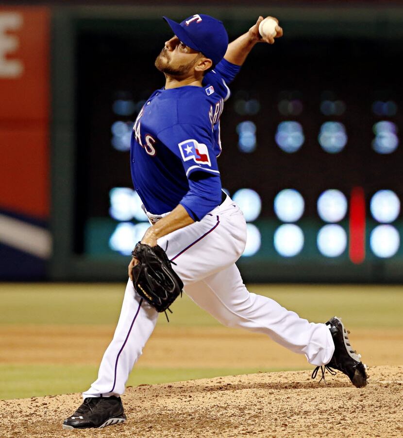 Texas Rangers relief pitcher Joakim Soria works against Minnesota Twins batters during the...