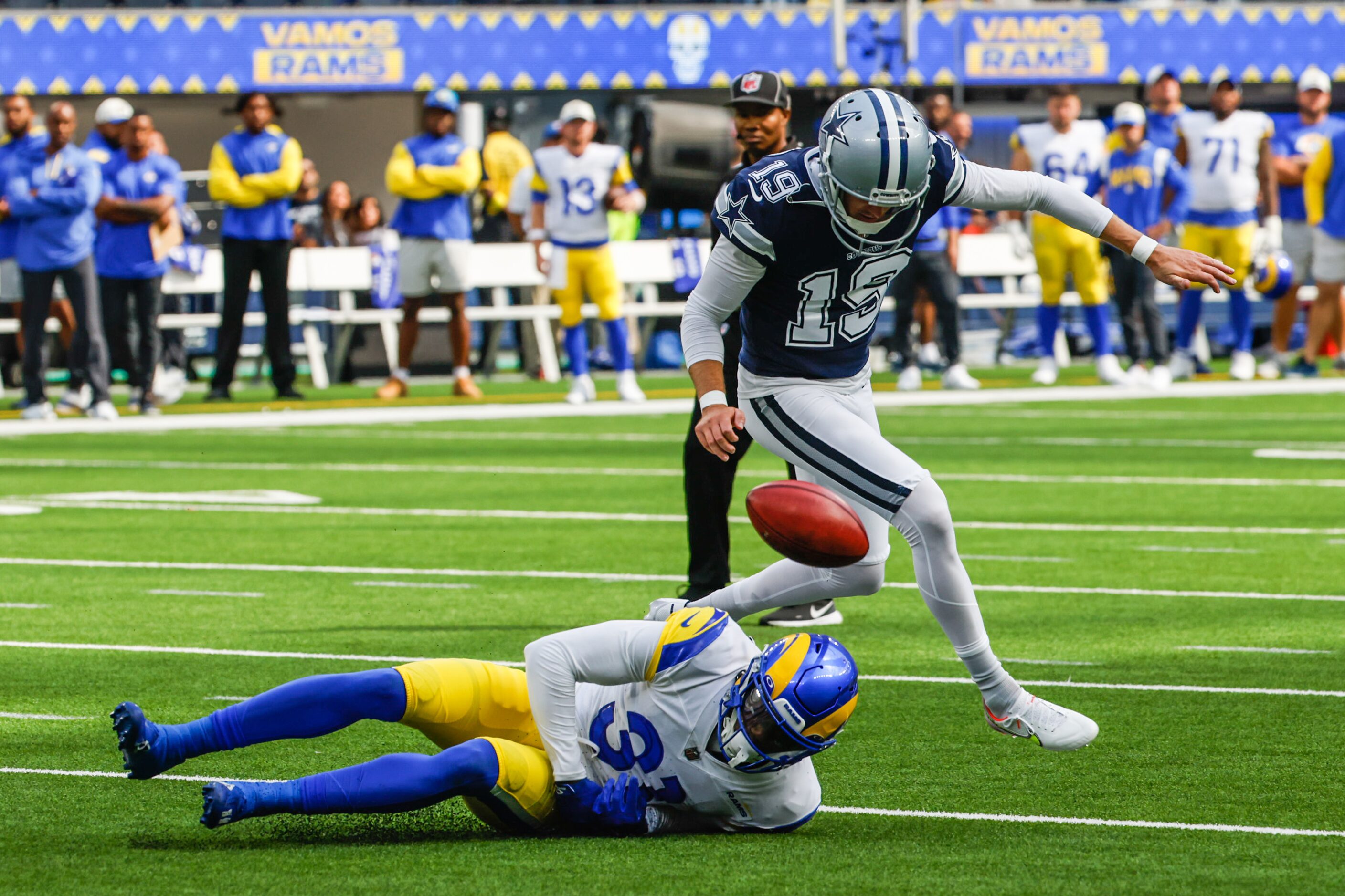 Dallas Cowboys placekicker Brett Maher (190 misses the ball for a kick as Los Angeles Rams...