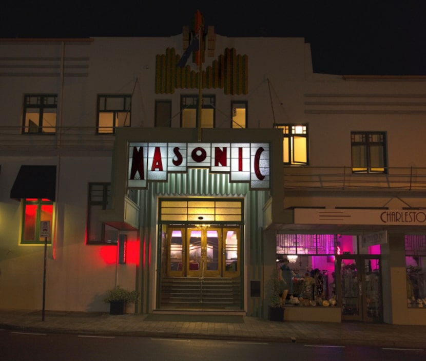 The entrance of Napier, New Zealand's Masonic Hotel, featuring a canopy of stained glass...