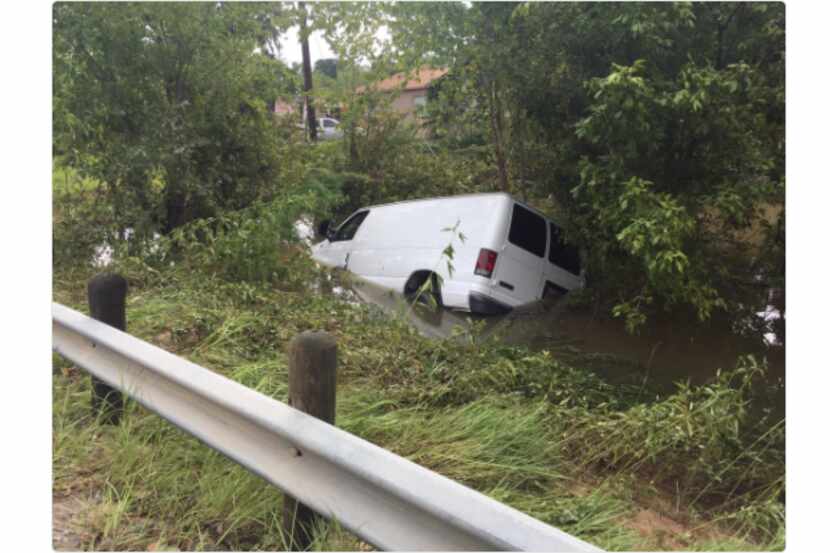 A van in which six members of a Houston family were traveling when it was swept off a...
