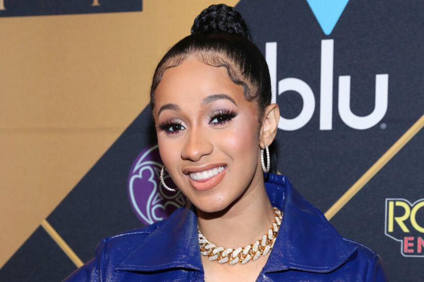 FILE - In this Feb. 3, 2018 file photo, Cardi B arrives at the Maxim Super Bowl Party in...