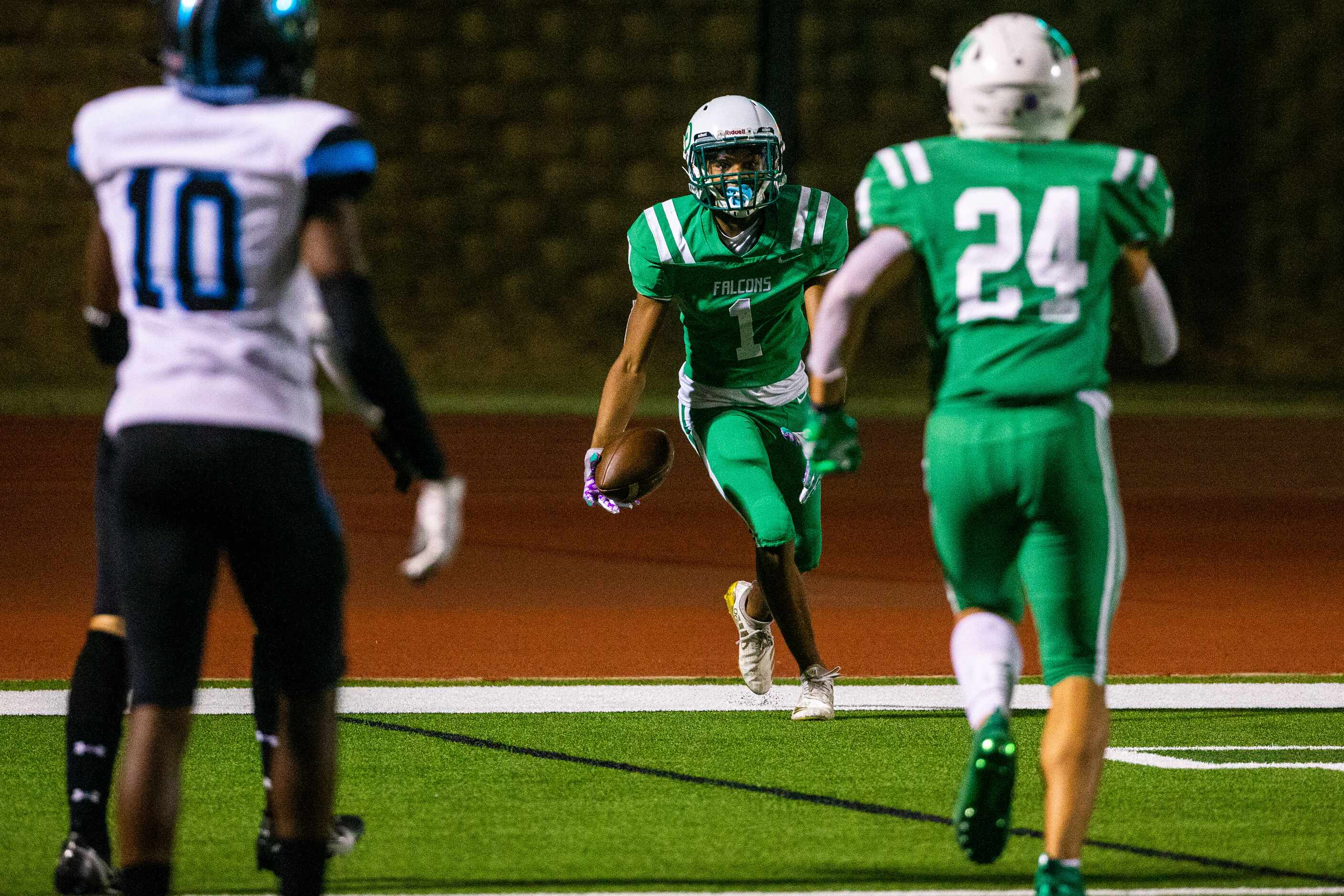 Lake Dallas wide receiver Micaiah Brooks (1) celebrates a touchdown run during the first...