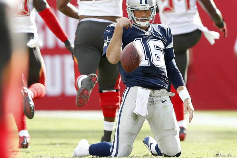 Dallas Cowboys quarterback Matt Cassel (16) sits dejected after getting stopped on third...