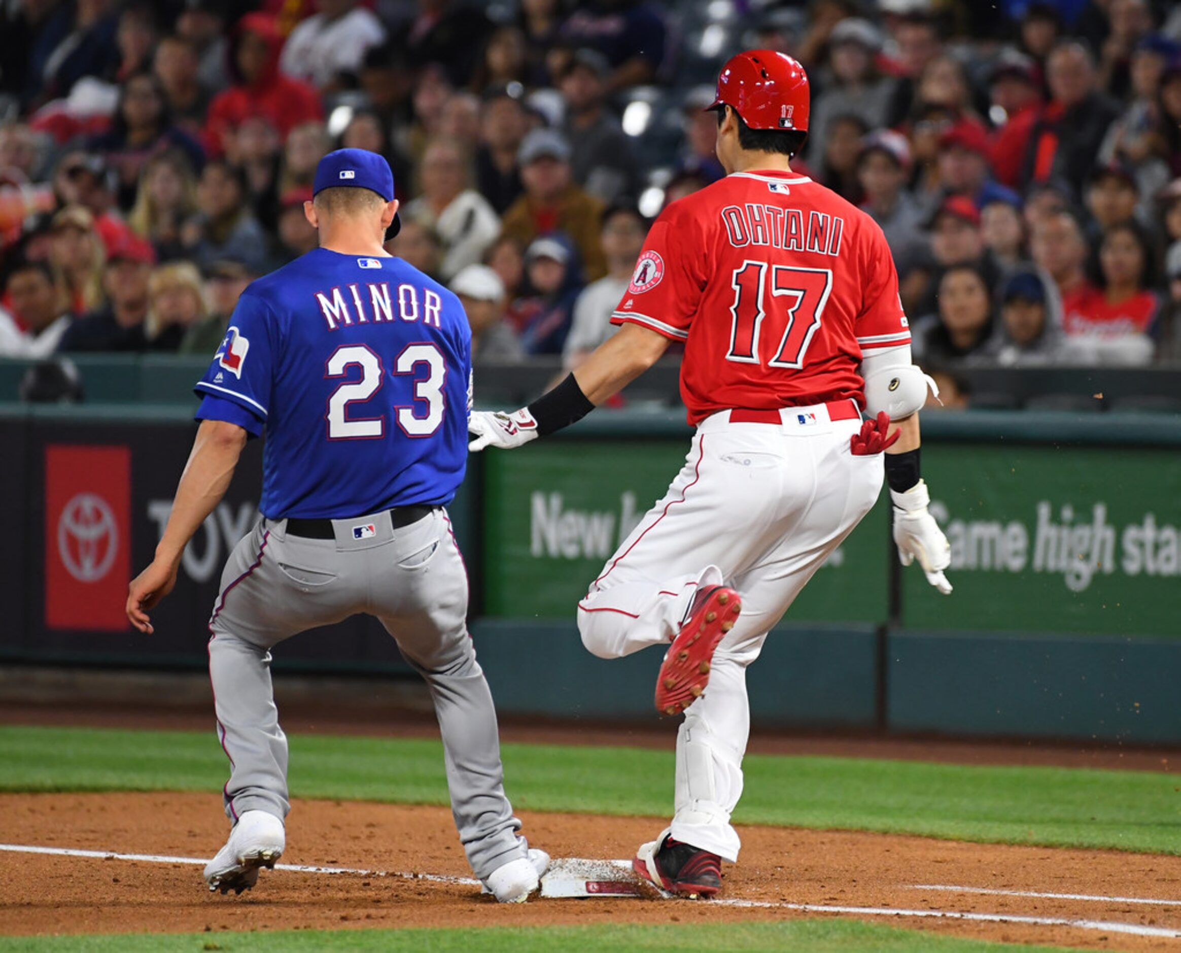 ANAHEIM, CA - MAY 25: Shohei Ohtani #17 of the Los Angeles Angels of Anaheim beat the throw...