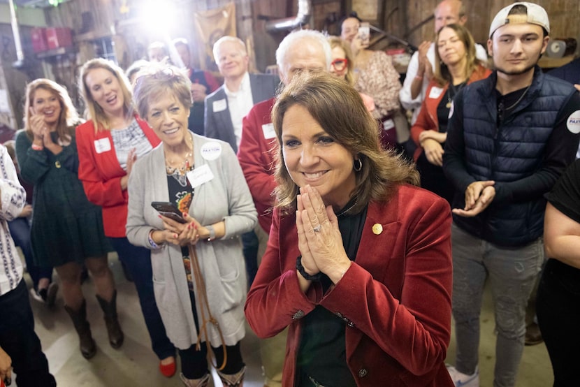 In November 2022 file photo, state Sen. Angela Paxton smiles while listening to election...