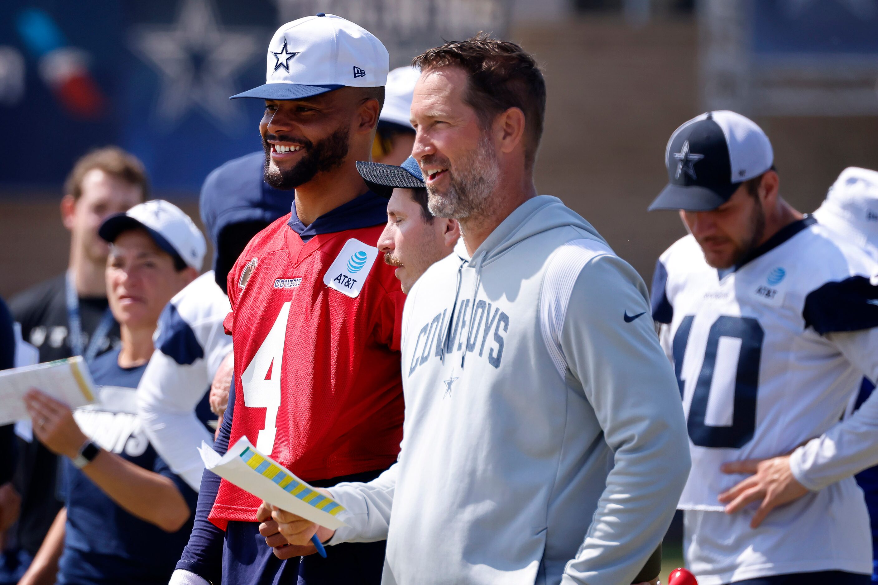 Dallas Cowboys quarterback Dak Prescott (4) and offensive coordinator Brian Schottenheimer...