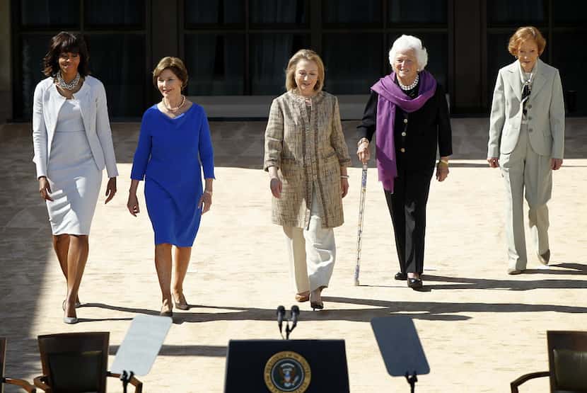 The five first ladies (from left) Michelle Obama, Laura Bush, Hillary Clinton, Barbara Bush,...