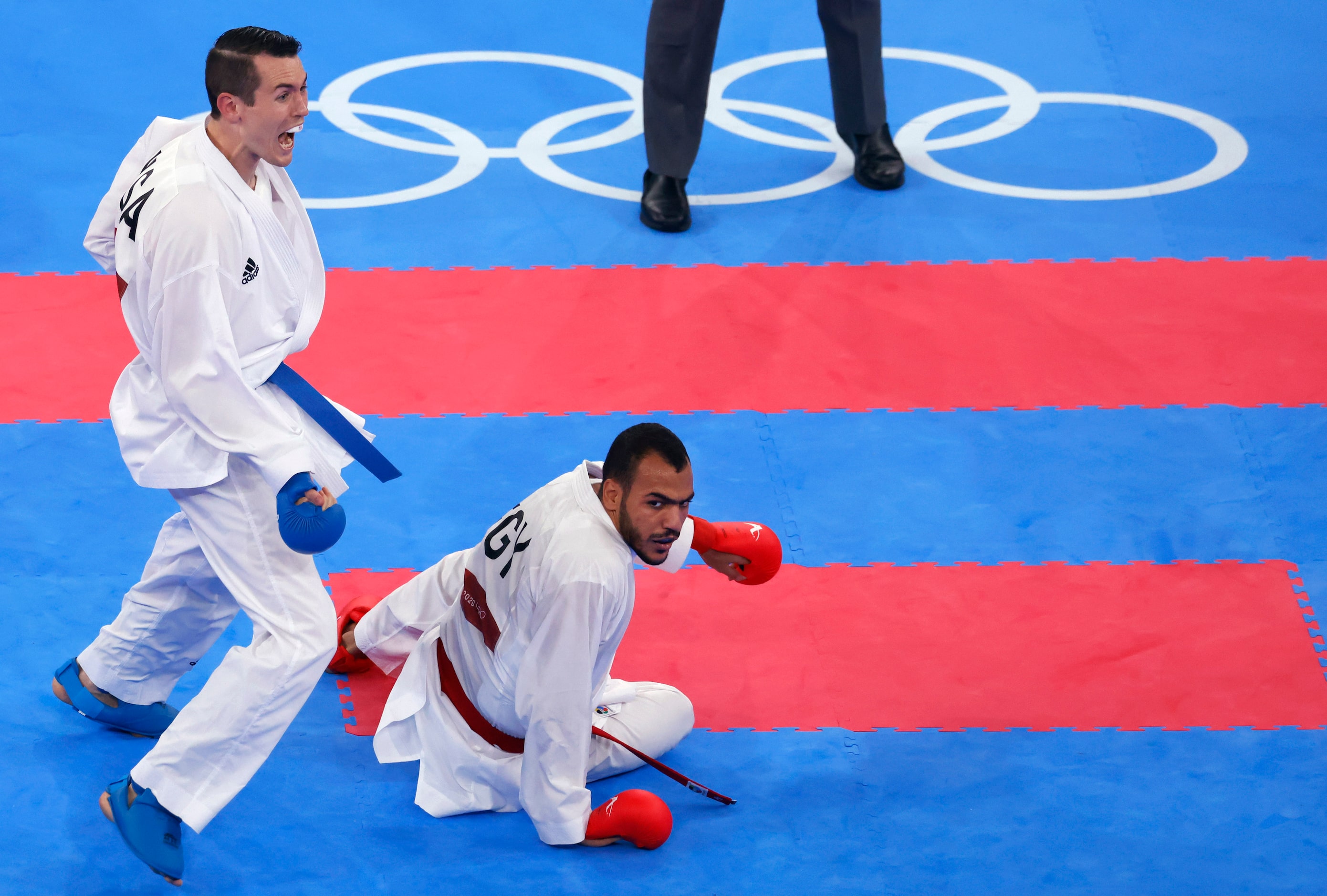 USA’s Tom Scott celebrates after scoring a point on Egypt’s Abdalla Abdelaziz during the...