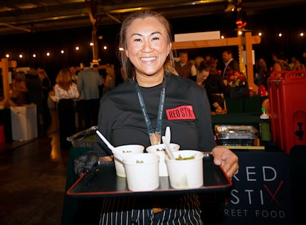 Uno Immanivong, owner/chef of Red Stix, at her booth during the Zoo to Do fundraiser at Fair...