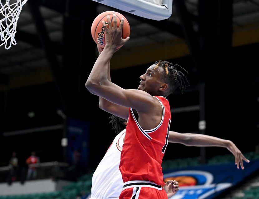 Mansfield Legacy’s Isaiah Manning (1) Keller Central’s  Winston Jones in the second half...