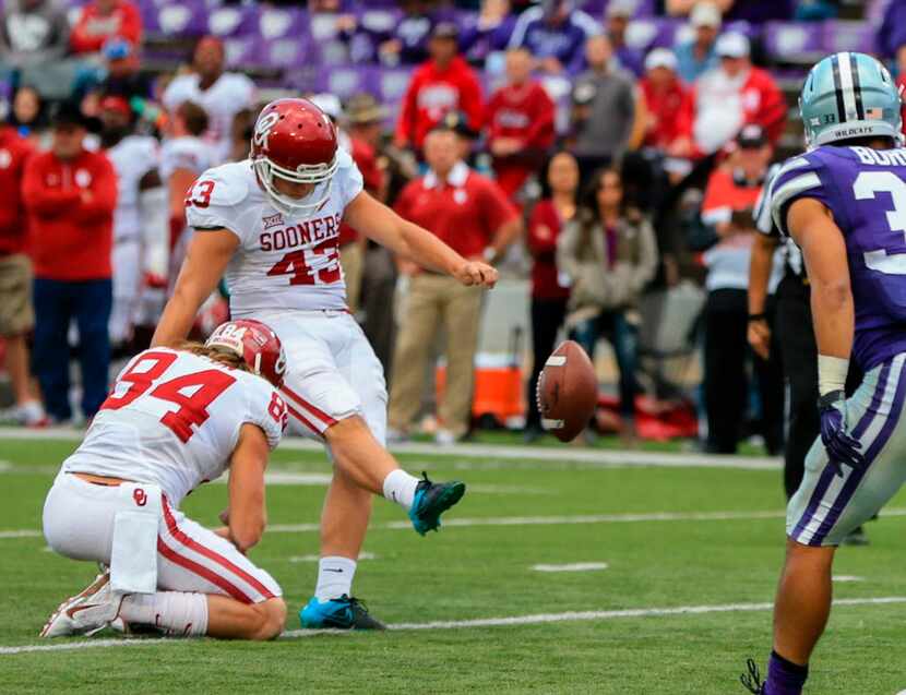 Oklahoma kicker Austin Seibert (43) kicks an extra point during the second half of an NCAA...