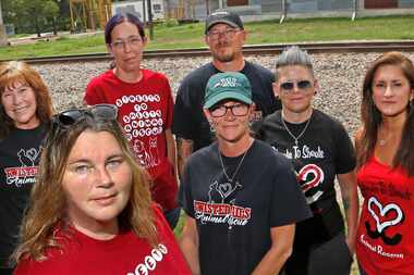 Mysti Boehler (second from left), the leader of Streets to Sheets, poses with members of her...