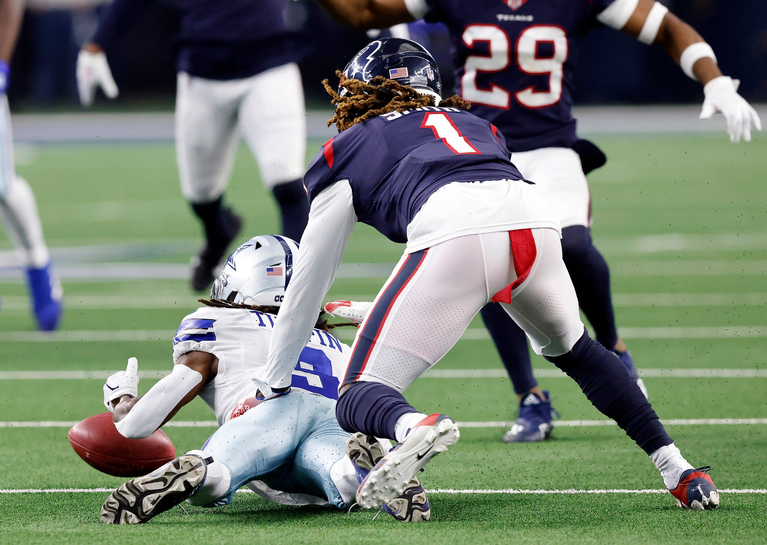 Dallas Cowboys wide receiver KaVontae Turpin (9) drops a punt and turns it over to the...