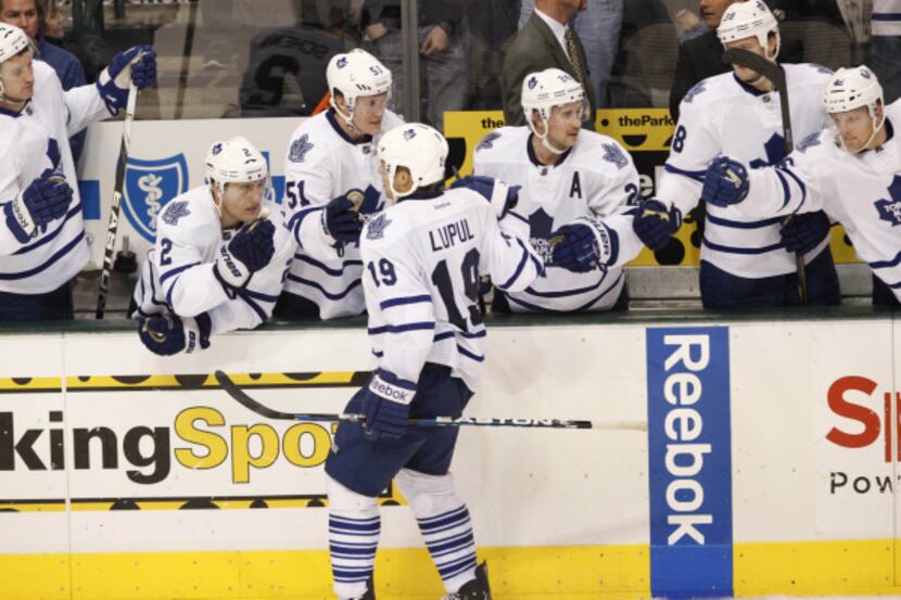 Toronto’s Joffrey Lupul is congratulated by teammates after scoring the only goal in the...