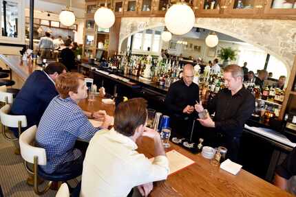 Each Hudson House has a long wooden bar and decor meant to evoke memories of seafood houses...