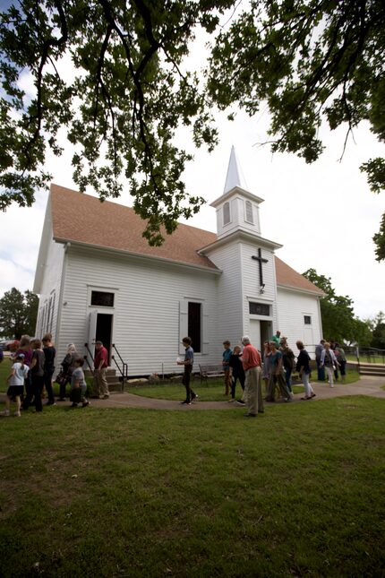 Churchgoers file out of College Mound United Methodist Church to enjoy the 2019 Decoration...