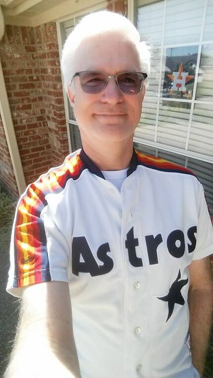 News multiplatform editor Frank L. Christlieb, wearing an Astros jersey he's had since the...