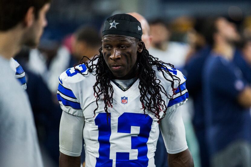 Dallas Cowboys wide receiver Lucky Whitehead (13) walks on the sideline during the third...