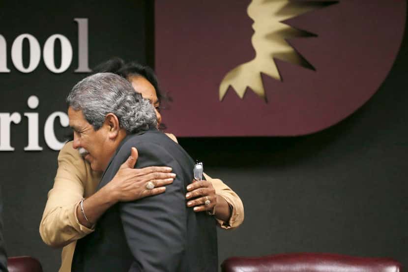 
Trustee Joyce Foreman hugged Michael Hinojosa after he was named superintendent Tuesday....