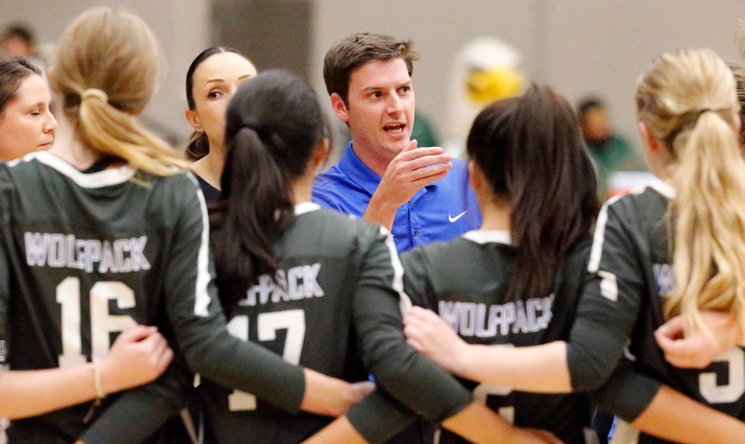 Plano West High School head coach Cooper Phillips gives instruction during a time out in...