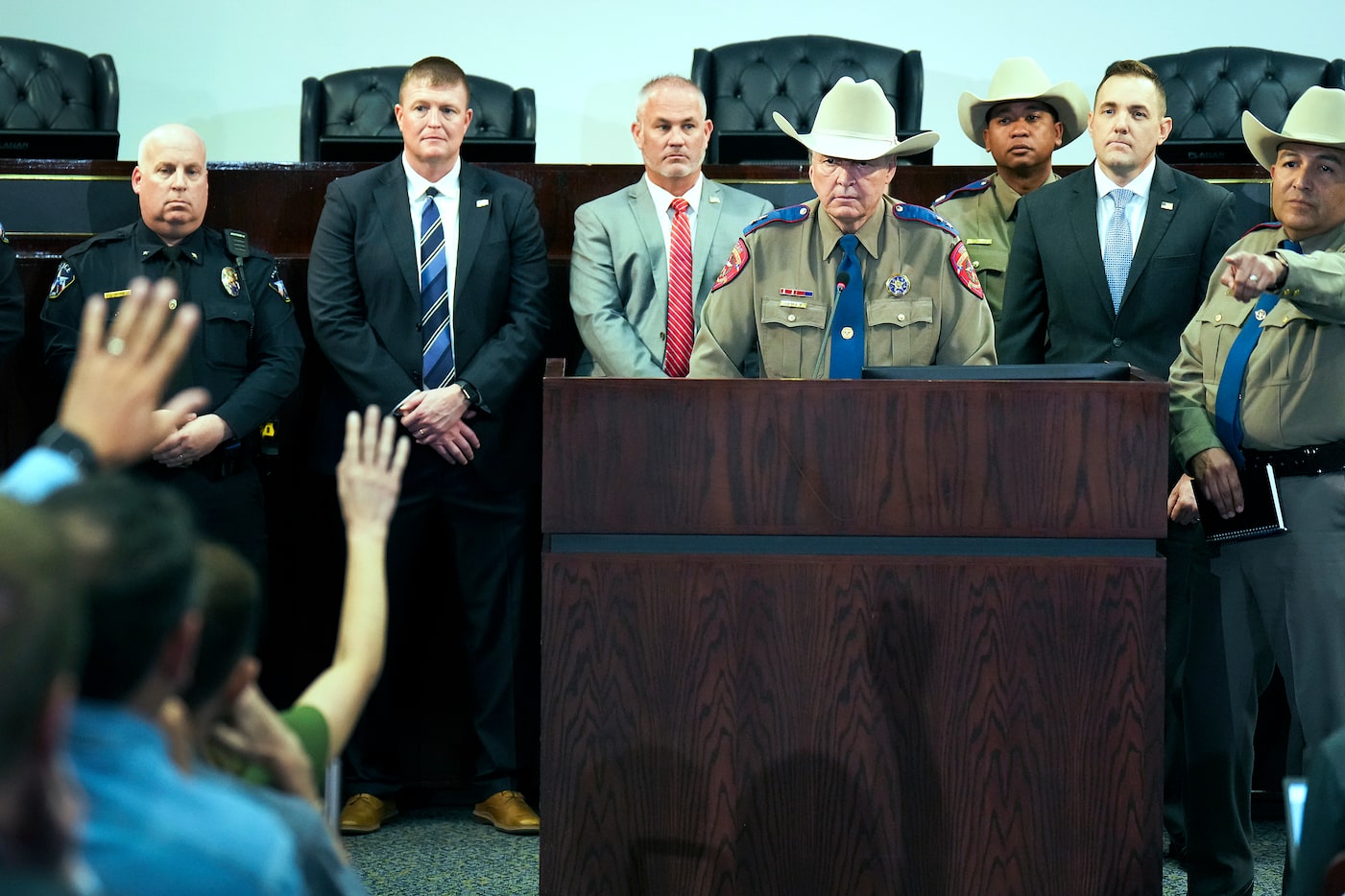 Hank Sibley, regional director of the Texas Department of Public Safety, takes questions...