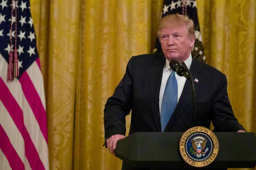 President Donald Trump pauses while speaking during an event about the environment in the...