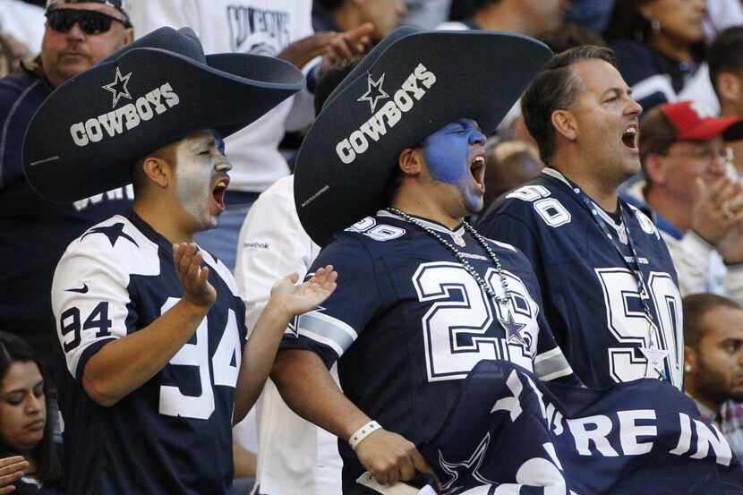 Dallas Cowboys fans cheer during an NFL football game against the New York Giants Sunday,...