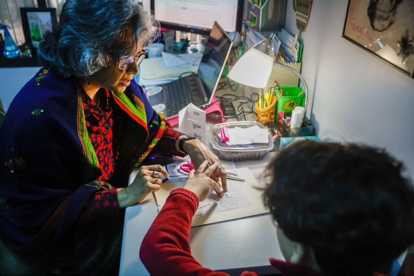 Science teacher Saba Ansari (left) worked with student Elon Ullmann on a project about...