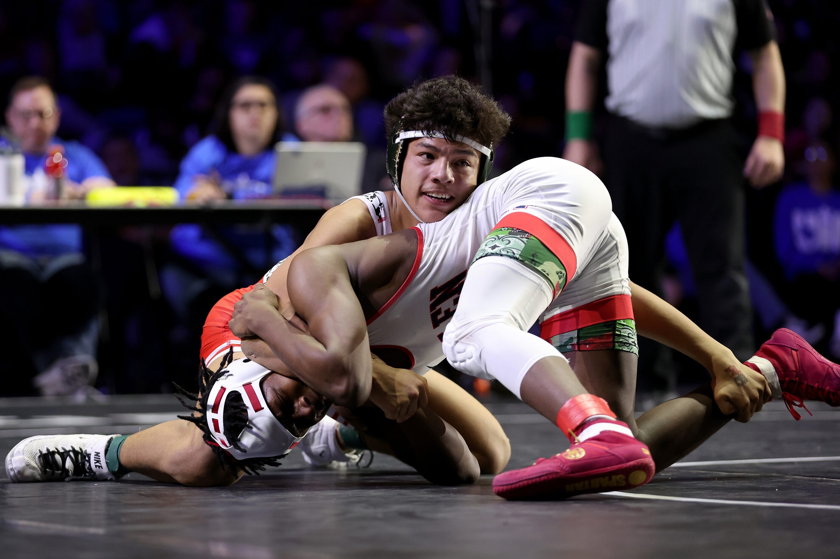 Javin Jackson-Bey (white) of Allen competes against Nicholas Zamora of Arlington Martin in...