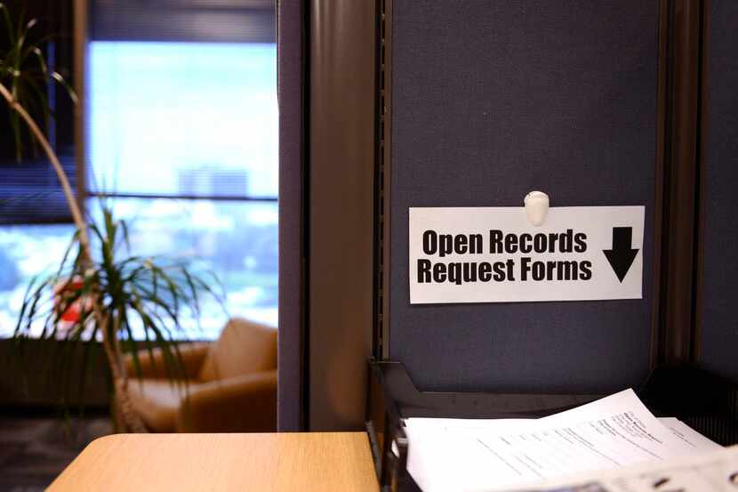 
A tray containing blank open records request forms sits n a table at Dallas’public...