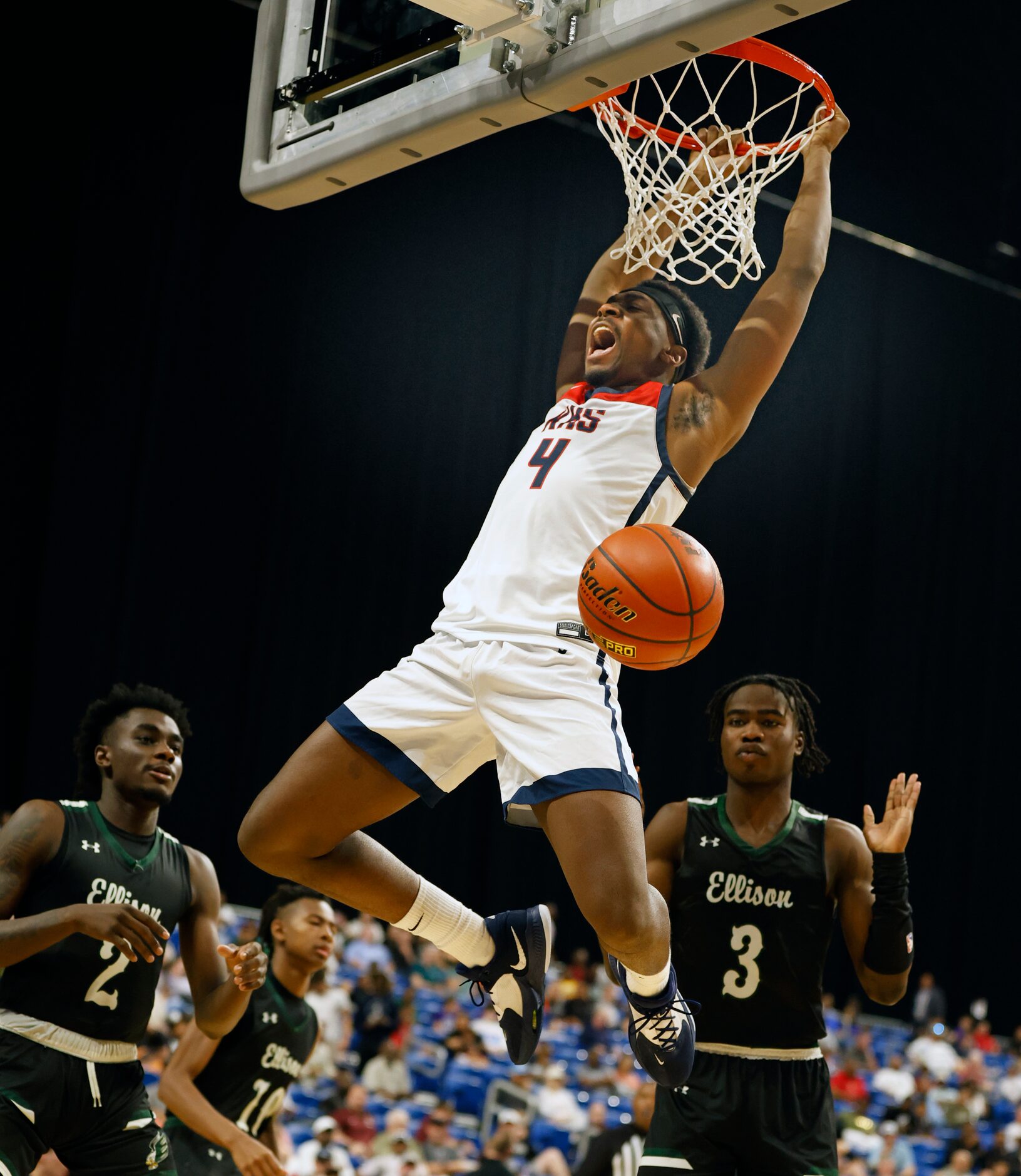 Dallas Kimball DaCannon Wickware (4) celebrates after a dunk. Dallas Kimball defeated...