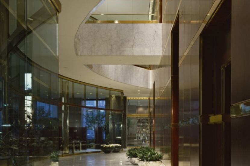 
With rich woods and polished stone, Trammell Crow Center’s lobby is the height of 1980s...