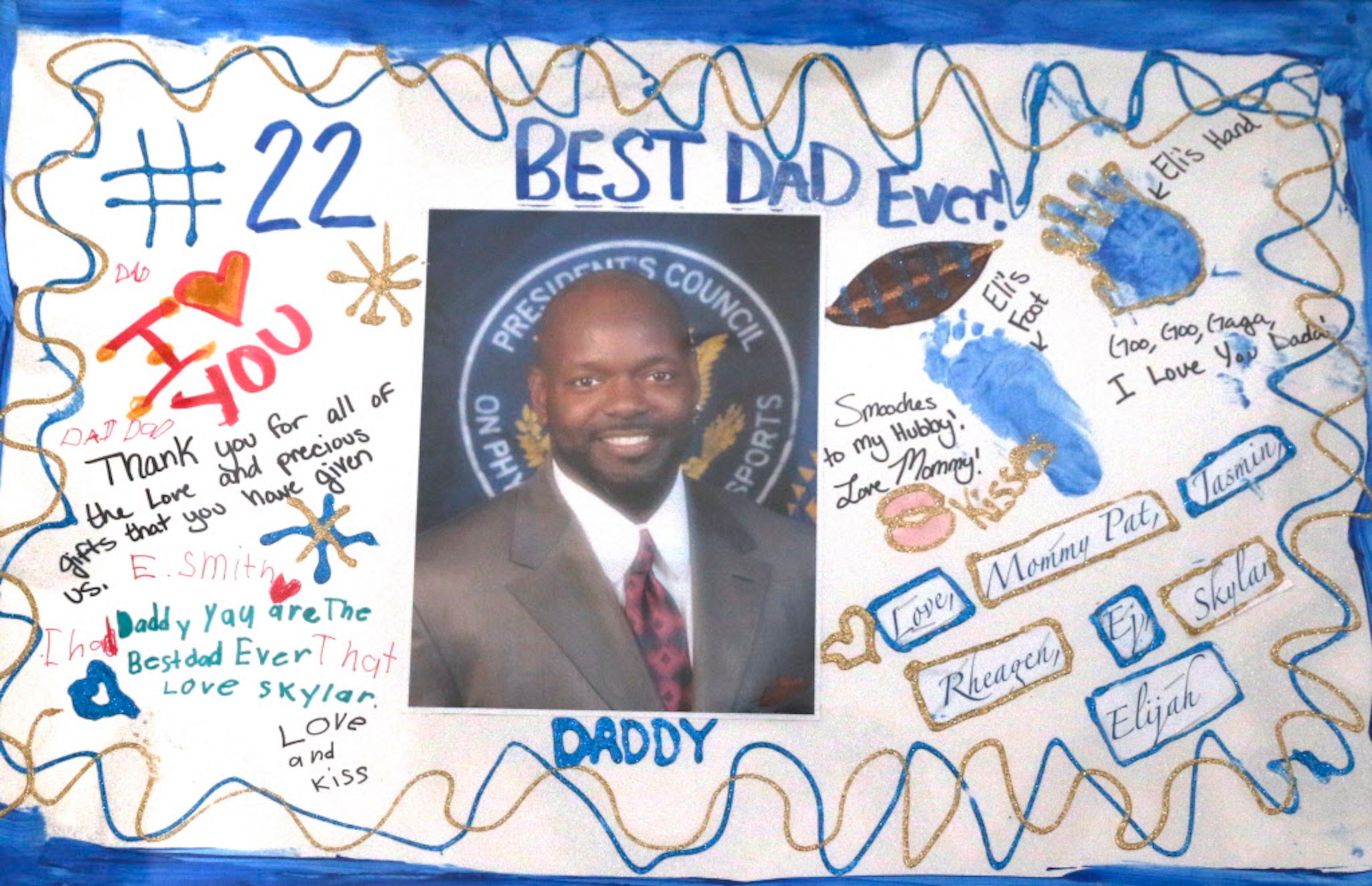 A best dad ever poster made by blank is on display in the game room of Emmitt and Pat Smith....