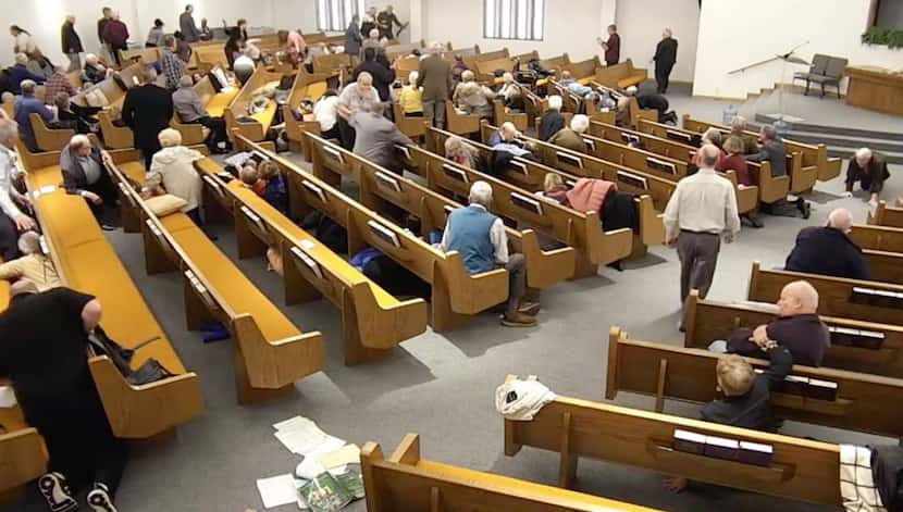 A video Framegrab of West Freeway Church of Christ security officer Jack Wilson, top center,...