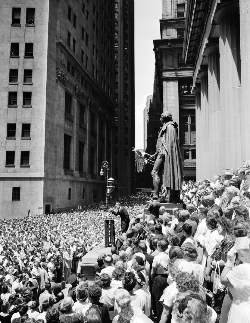 Under a statue of George Washington, evangelist Billy Graham used the steps of Federal Hall...