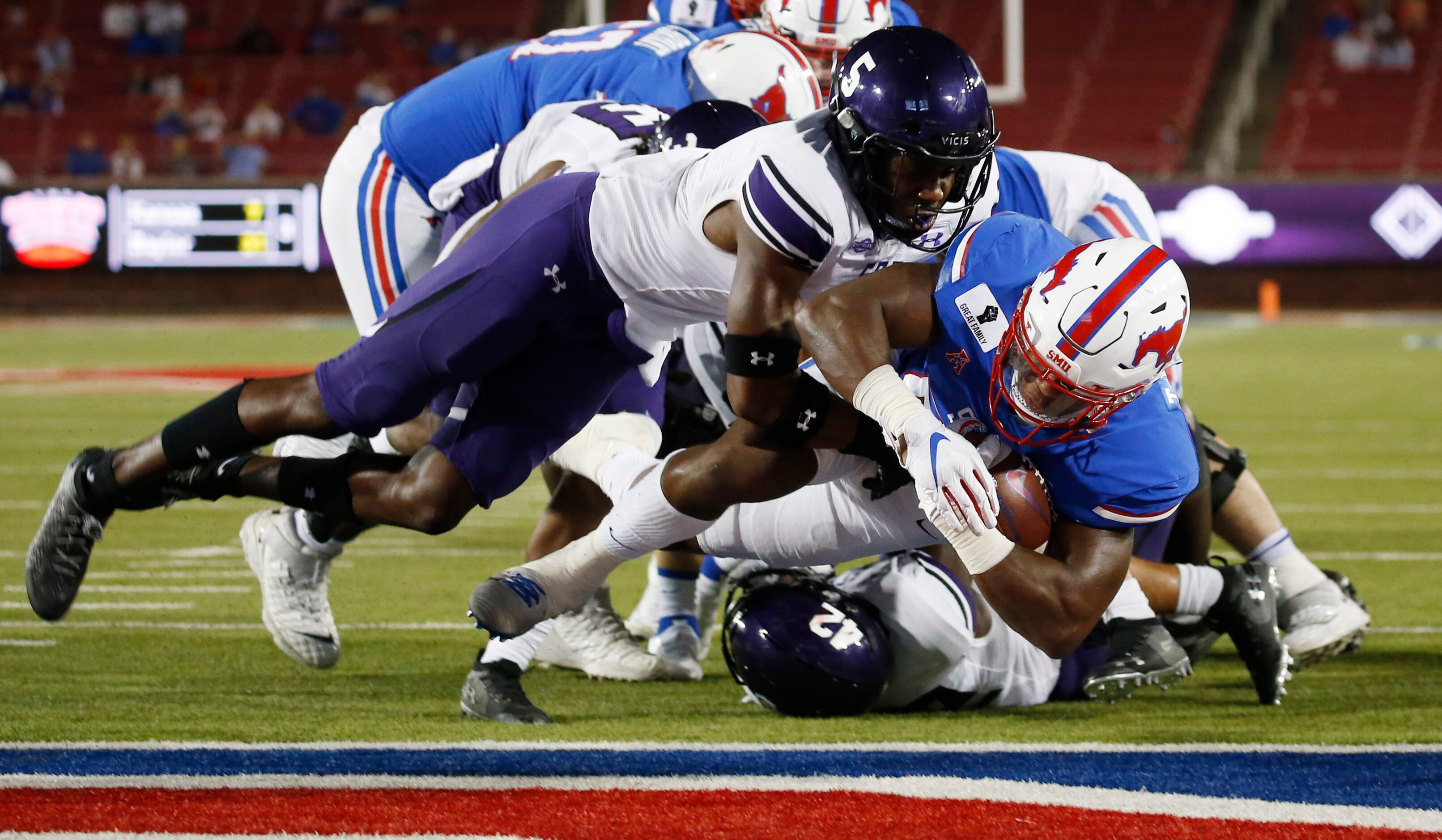 Southern Methodist Mustangs running back TaMerik Williams (21) leaps into the end zone for a...