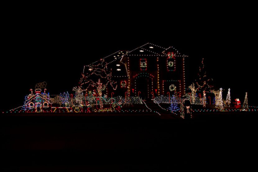 4334 Bluffview Drive, Sachse: Thousands of bright lights, various outdoor Christmas trees...