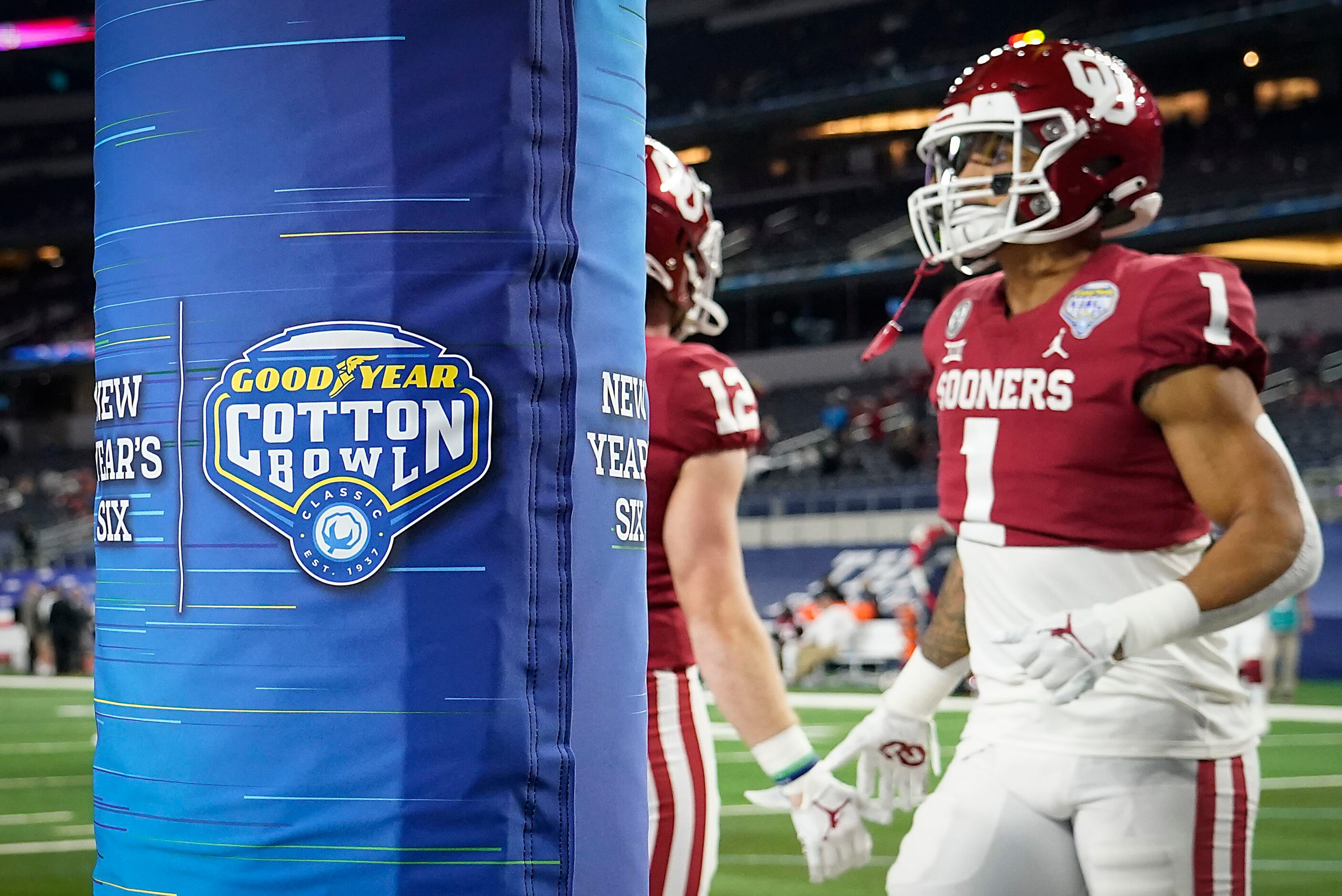 Oklahoma players warm up before the Cotton Bowl Classic against Florida at AT&T Stadium on...