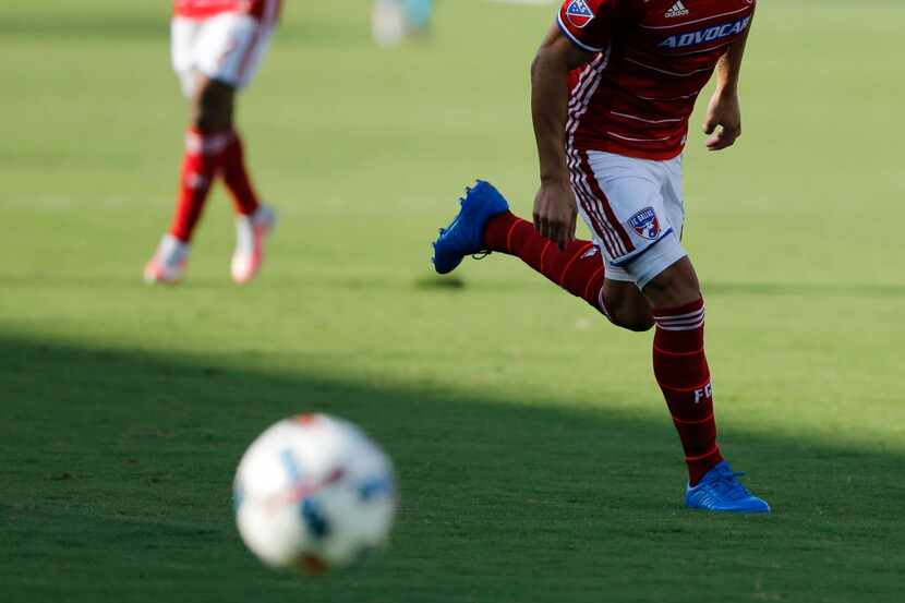 FC Dallas defender Hernan Grana (2) watches his pass go forward during the first half of an...