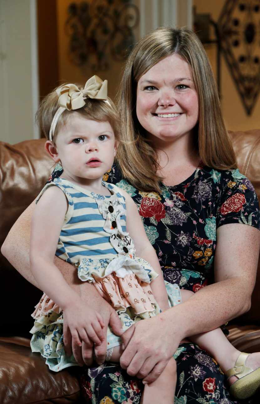 Jessica Hitt and her daughter, Olivia, 2,  recently posed for a photo at their home in...