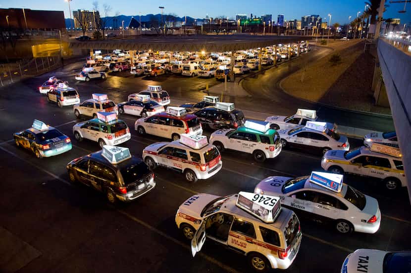 Taxis await their turn to pick up passengers at McCarran International Airport in Las Vegas.